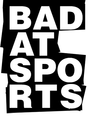 A bold, minimalist logo for "Bad at Sports" featuring large white text arranged in a stacked format against a black background.